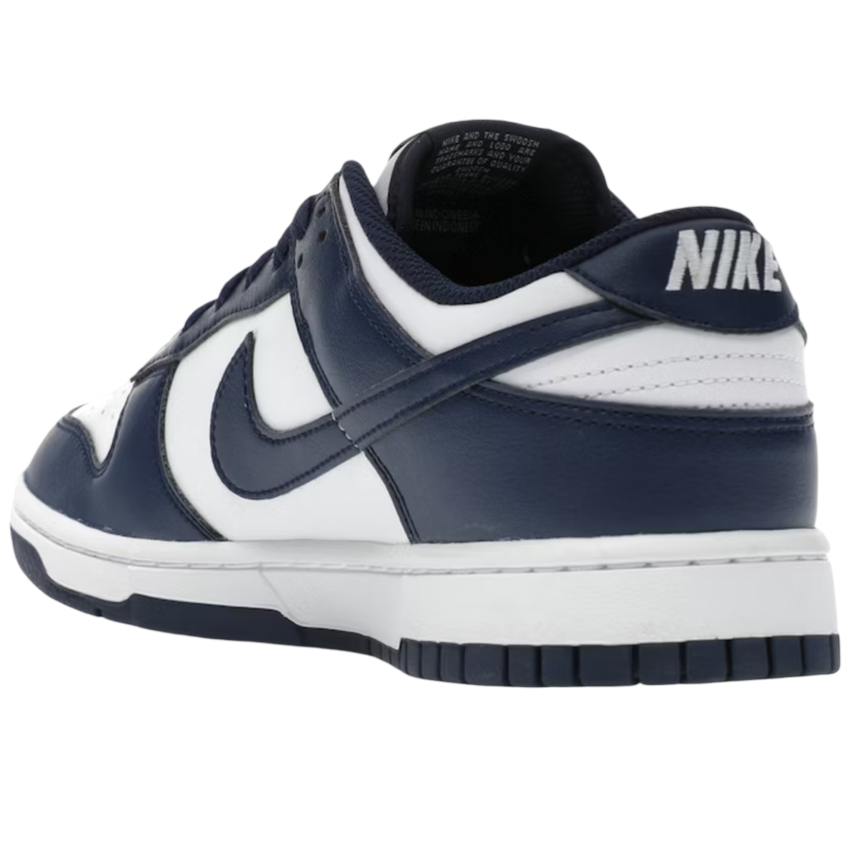 Nike Dunk Low White Midnight Navy sneakers i en sideprofil med glat hvid læderbase, mørkeblå overlays, hvide snørebånd og hvid mellemsål.